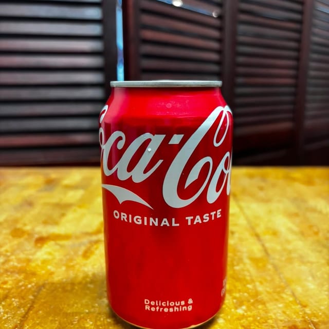 Regular Coke Can.